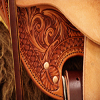 Half Breed Wade Saddle by Keith Valley Specs: Wade tree by Rick Reed 16 inch seat Gullet - 7 & 1/2H by 6 & 1/4W by 4 94 Degree Bars Horn - 3 & 5/8ths high by 4 & 1/2 Guatelajara Cantle - 4&1/2 inches high by 12&1/2 inches wide Cheyenne Roll - 1 & 3/4 inches 7/8ths flat plate riggin, Vaquero Geometric Border with Sheridan Style Floral Stainless Steel Hardware - by Harwood 4&1/2 inch Monel Stirrups Santa Barbara twisted stirrup leathers Full length stirrup leathers 32 inch 100% Mohair Roper Cinch 7 foot latigos - both sides Ready to ride and go to work.
